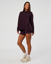 Woman wearing Go-To Long Sleeve FLXCotton Oversized Tee - Midnight Plum-White | Model:Bianca | Size:S | Thumbnail Index: 4