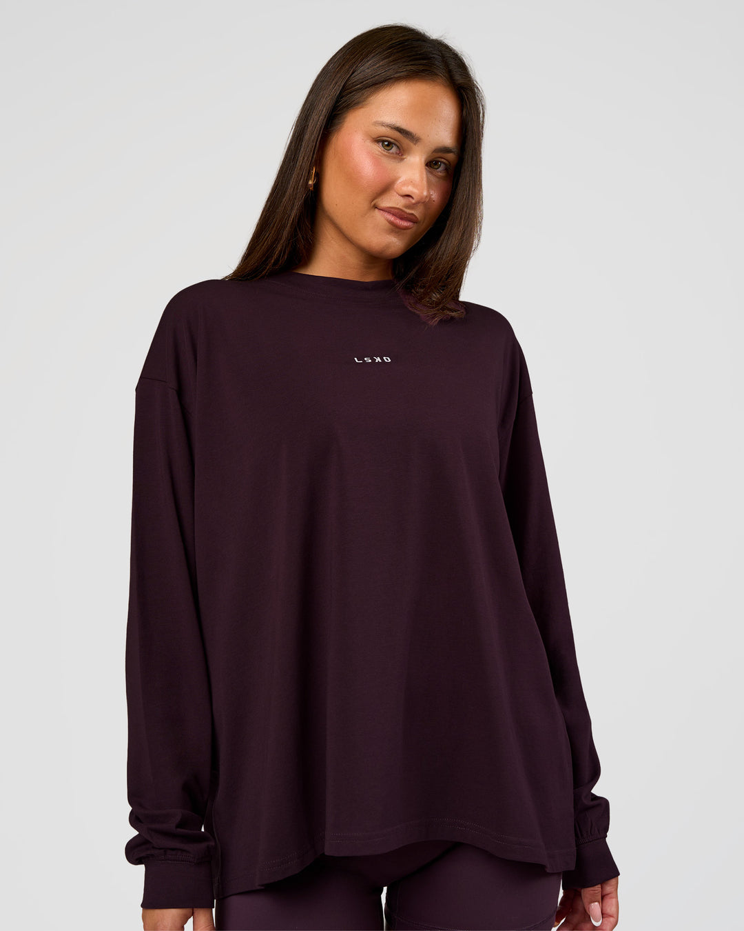 Woman wearing Go-To Long Sleeve FLXCotton Oversized Tee - Midnight Plum-White | Model:Bianca | Size:S - view 1