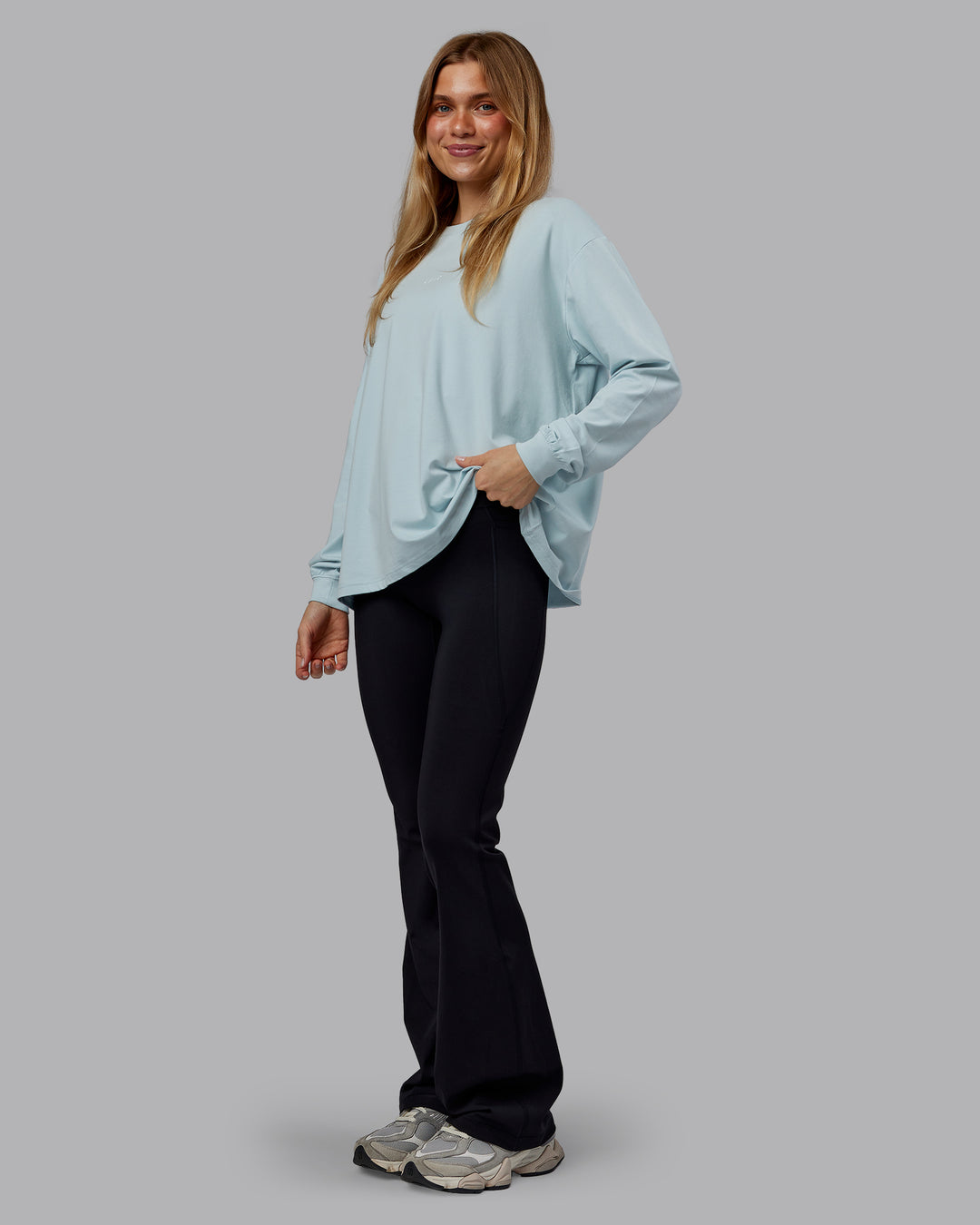 Woman wearing Go-To Long Sleeve FLXCotton Oversized Tee - Skyride-White | Model:Emilie | Size:S - view 4