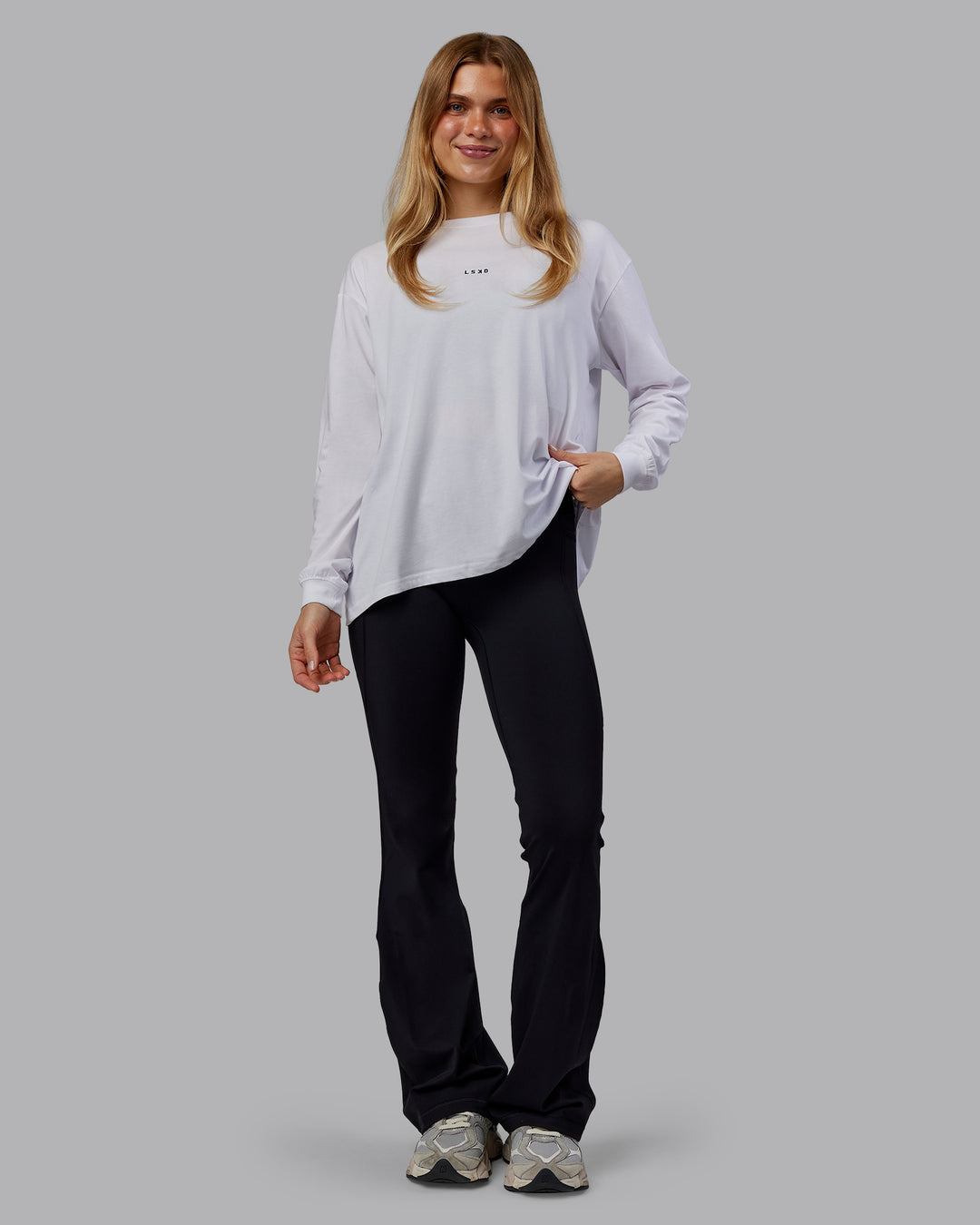 Woman wearing Go-To Long Sleeve FLXCotton Oversized Tee - White-Black | Model:Emilie | Size:S - view 2