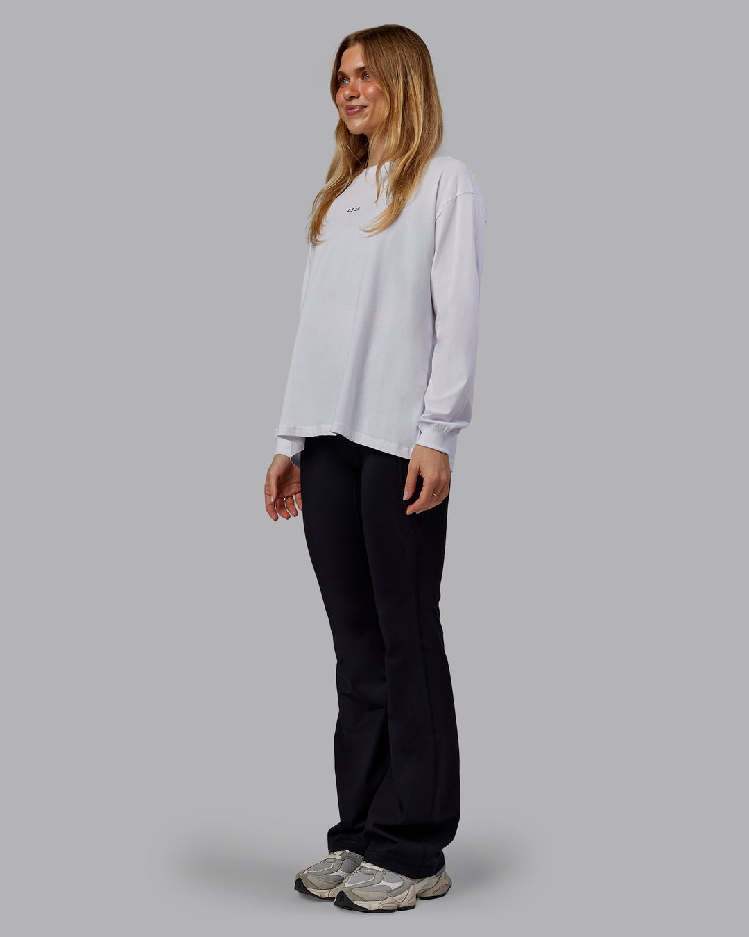Woman wearing Go-To Long Sleeve FLXCotton Oversized Tee - White-Black | Model:Emilie | Size:S - view 5