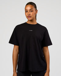 Woman wearing Go-To Love The Process FLXCotton Tee - Black-Palace Blue | Model:Rosie | Size:S | Thumbnail Index: 1