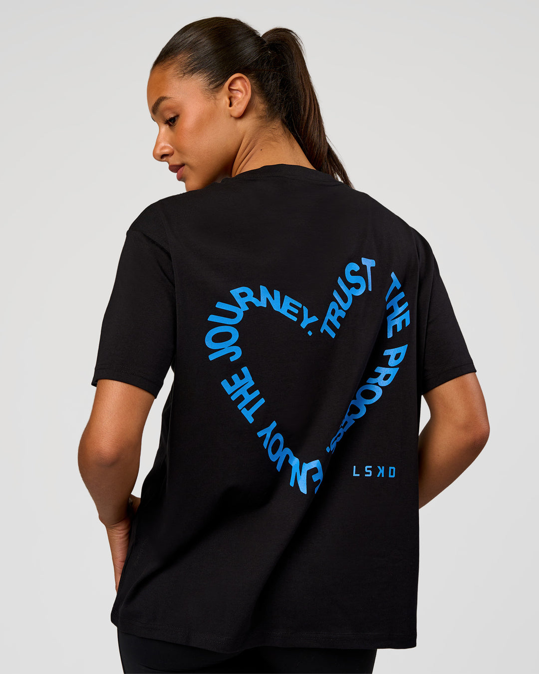Woman wearing Go-To Love The Process FLXCotton Tee - Black-Palace Blue | Model:Rosie | Size:S - view 1