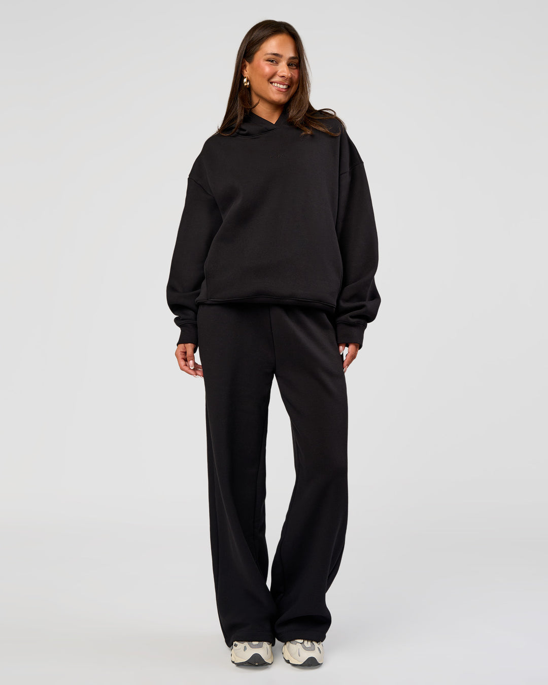 Woman wearing Go-To Oversized Hoodie - Black | Model:Bianca | Size:S - view 2