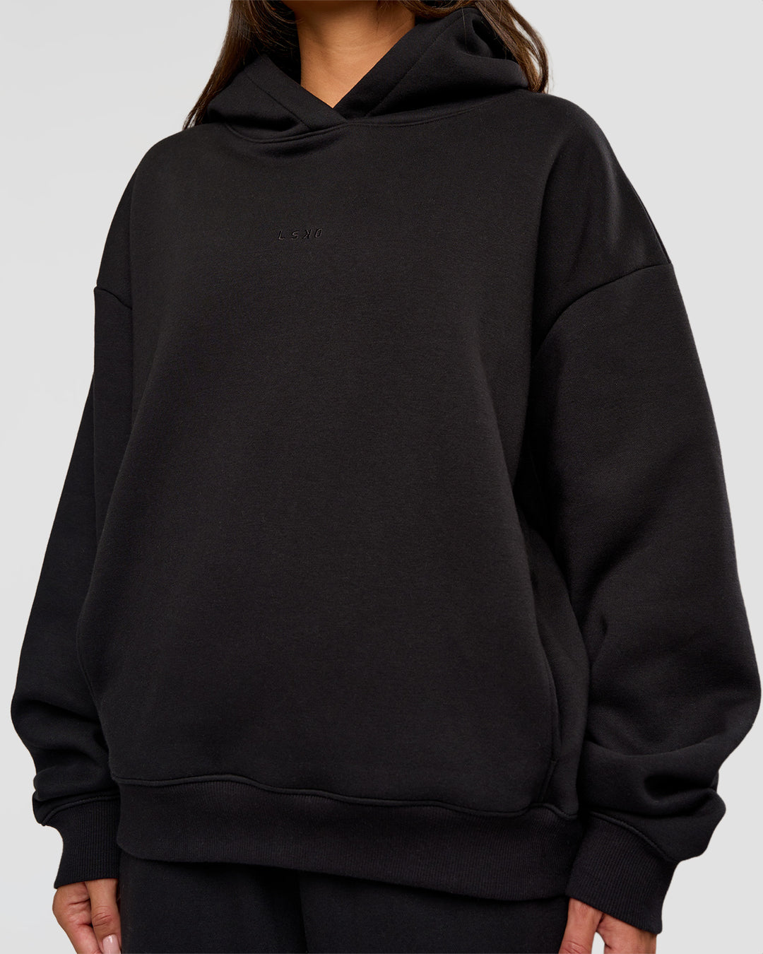 Woman wearing Go-To Oversized Hoodie - Black | Model:Bianca | Size:S - view 4