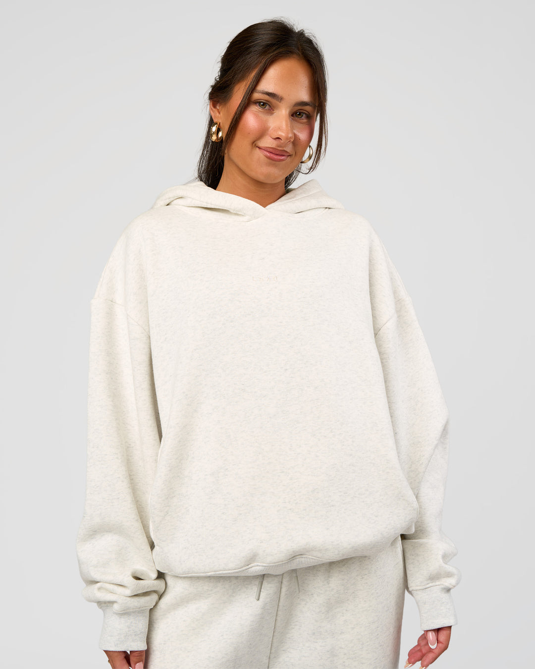 Woman wearing Go-To Oversized Hoodie - Silver Marl | Model:Bianca | Size:S - view 1