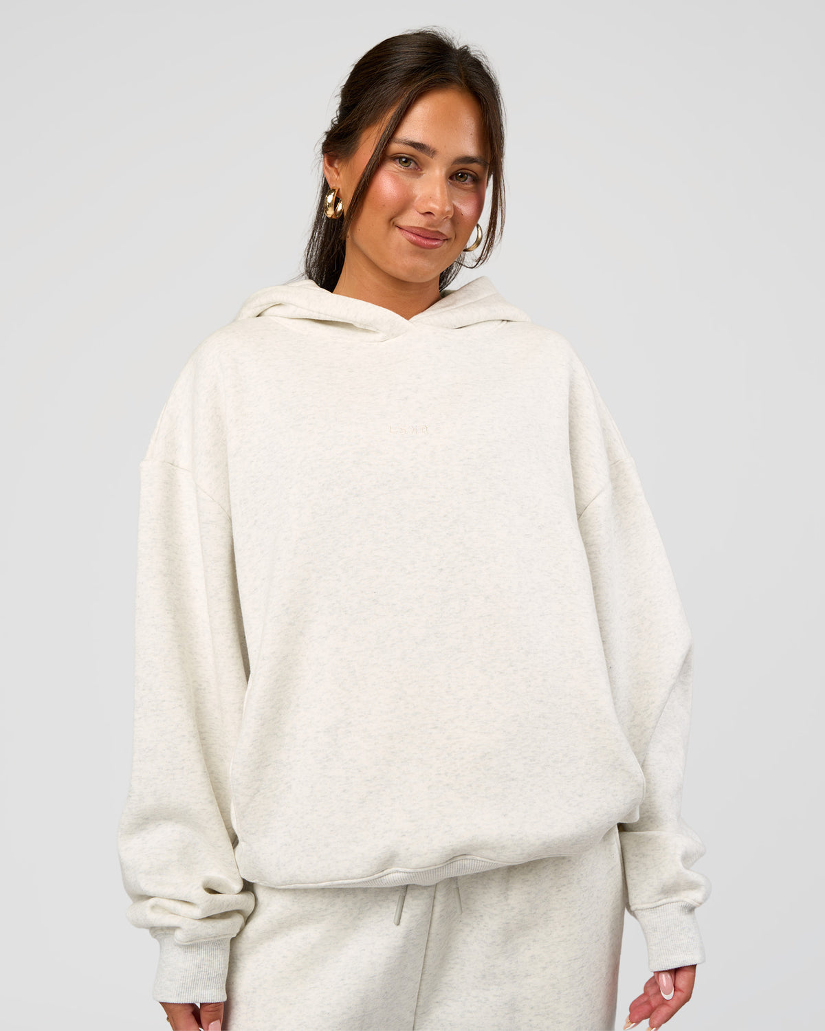 Woman wearing Go-To Oversized Hoodie - Silver Marl | Model:Bianca | Size:S