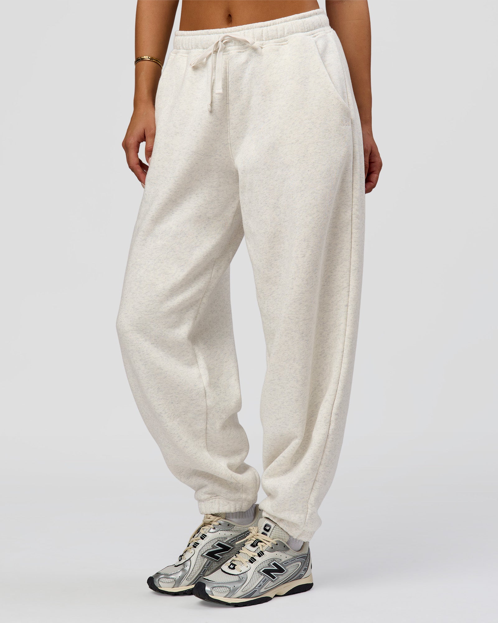 Woman wearing Go-To Oversized Track Pant - Silver Marl | Model:Bianca | Size:S