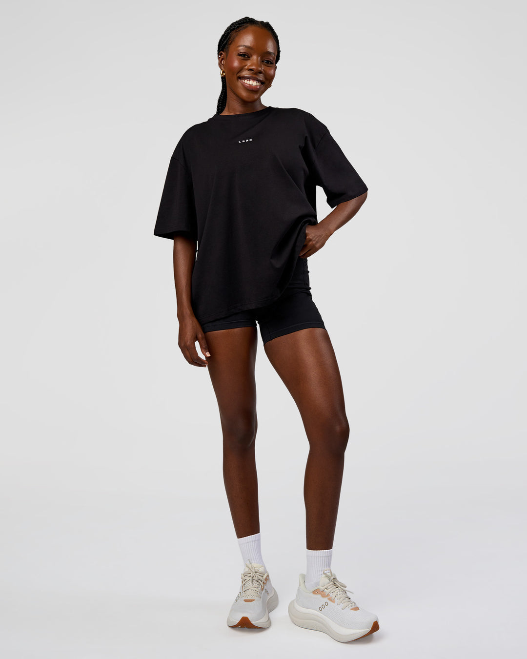 Woman wearing Go-To Run Club FLXCotton Oversized Tee - Black-Marshmallow | Model:Ellie | Size:S - view 5