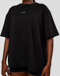Woman wearing Go-To Run Club FLXCotton Oversized Tee - Black-Marshmallow | Model:Ellie | Size:S | Thumbnail Index: 3