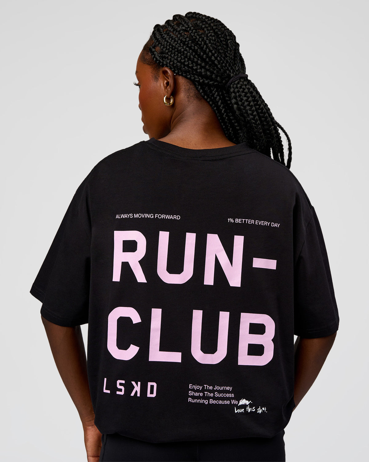 Woman wearing Go-To Run Club FLXCotton Oversized Tee - Black-Marshmallow | Model:Ellie | Size:S