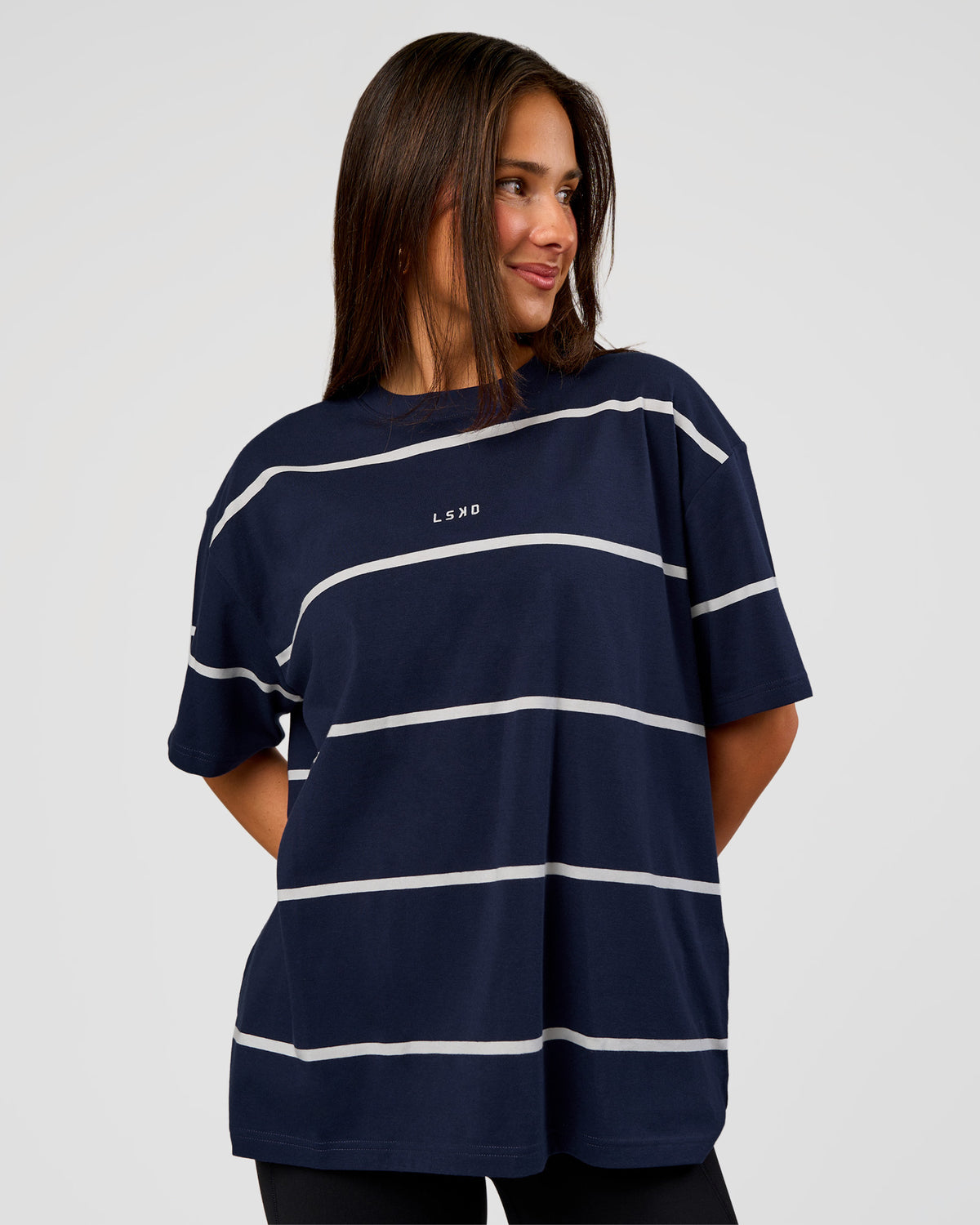 Woman wearing Go-To Stripe FLXCotton Oversized Tee - Future Navy-White | Model:Bianca | Size:S