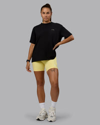 Woman wearing Go-To We Rise FLXCotton Oversized Tee - Black-Glacial Blue | Thumbnail Index: 5
