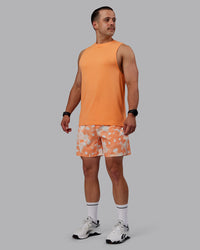 Man wearing Grand Slam 6" Shorts in Wildflower Cantaloupe | Size:S | Thumbnail Index: 6