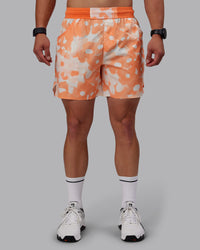 Man wearing Grand Slam 6" Shorts in Wildflower Cantaloupe | Size:S | Thumbnail Index: 7