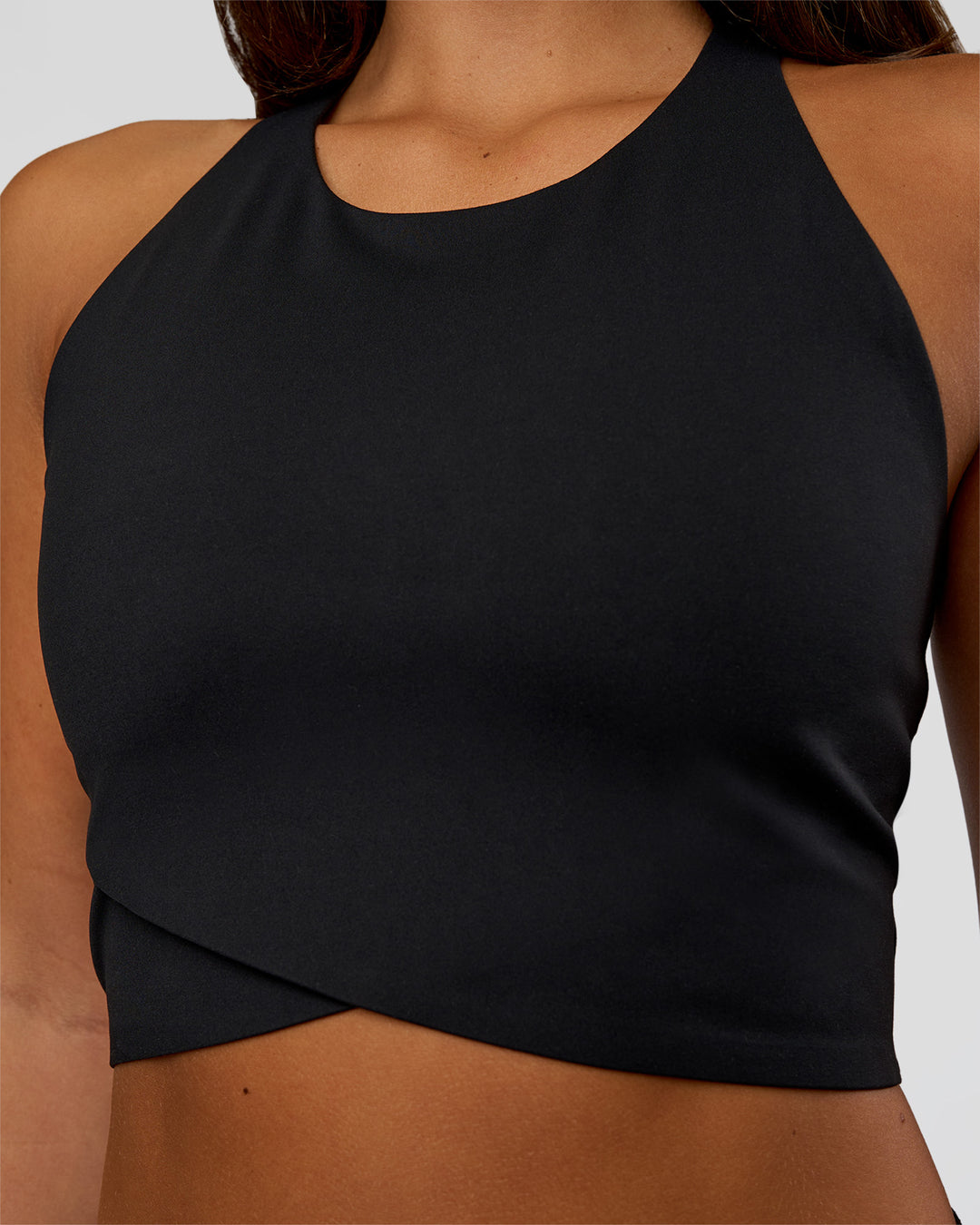 Woman wearing Hybrid Performance Crossover Tank - Black | Model:Bianca | Size:S - view 5