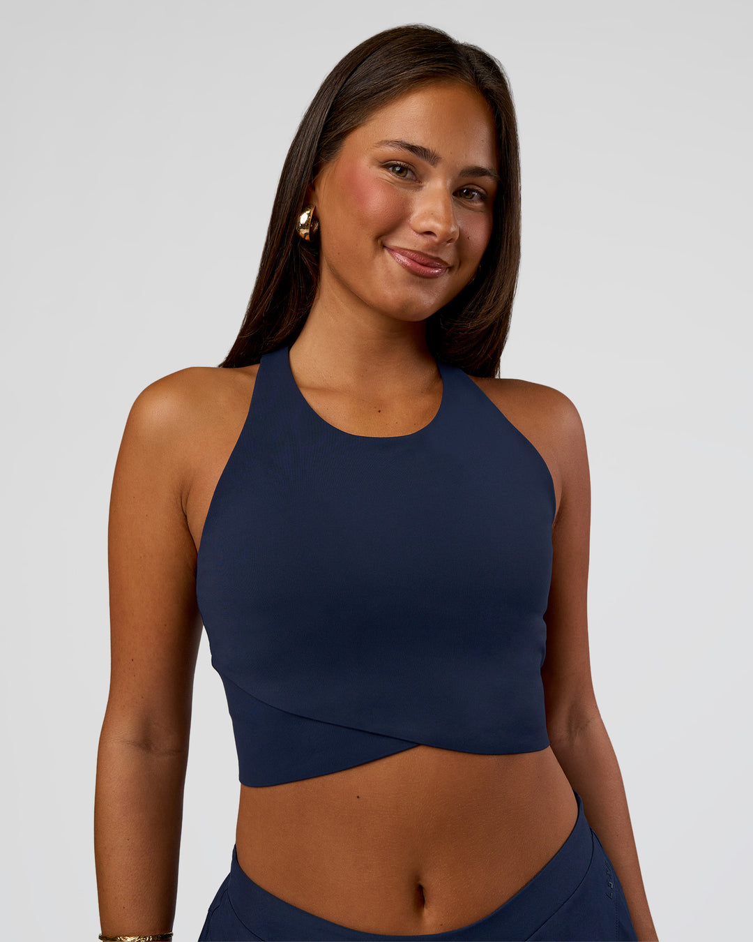 Woman wearing Hybrid Performance Crossover Tank - Future Navy | Model:Bianca | Size:S - view 2
