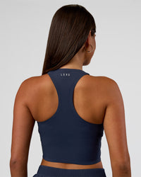Woman wearing Hybrid Performance Crossover Tank - Future Navy | Model:Bianca | Size:S | Thumbnail Index: 3