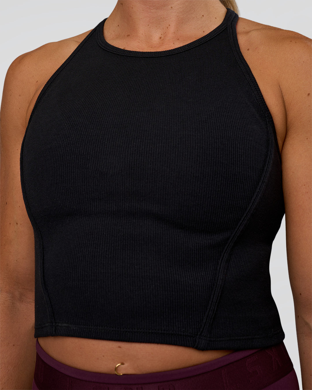 Woman wearing Ignite High Neck Tank - Black | Model:Sav | Size:S - view 5