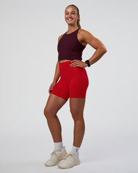 Woman wearing Ignite High Neck Tank - Cherry Lacquer | Model:Sav | Size:S | Thumbnail Index: 4