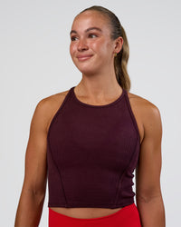 Woman wearing Ignite High Neck Tank - Cherry Lacquer | Model:Sav | Size:S | Thumbnail Index: 2