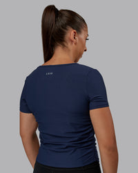 Woman wearing Ignite Ribbed Scrunch Side Cropped Tee - Future Navy | Size:S | Model:Tylah | Thumbnail Index: 2