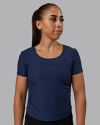Woman wearing Ignite Ribbed Scrunch Side Cropped Tee - Future Navy | Size:S | Model:Tylah | Thumbnail Index: 1