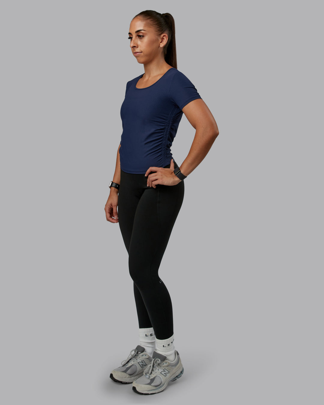 Woman wearing Ignite Ribbed Scrunch Side Cropped Tee - Future Navy | Size:S | Model:Tylah - view 1
