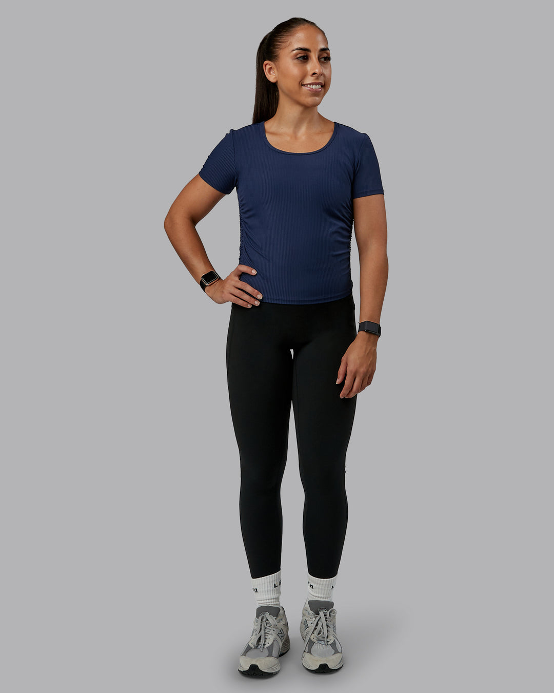Woman wearing Ignite Ribbed Scrunch Side Cropped Tee - Future Navy | Size:S | Model:Tylah - view 4