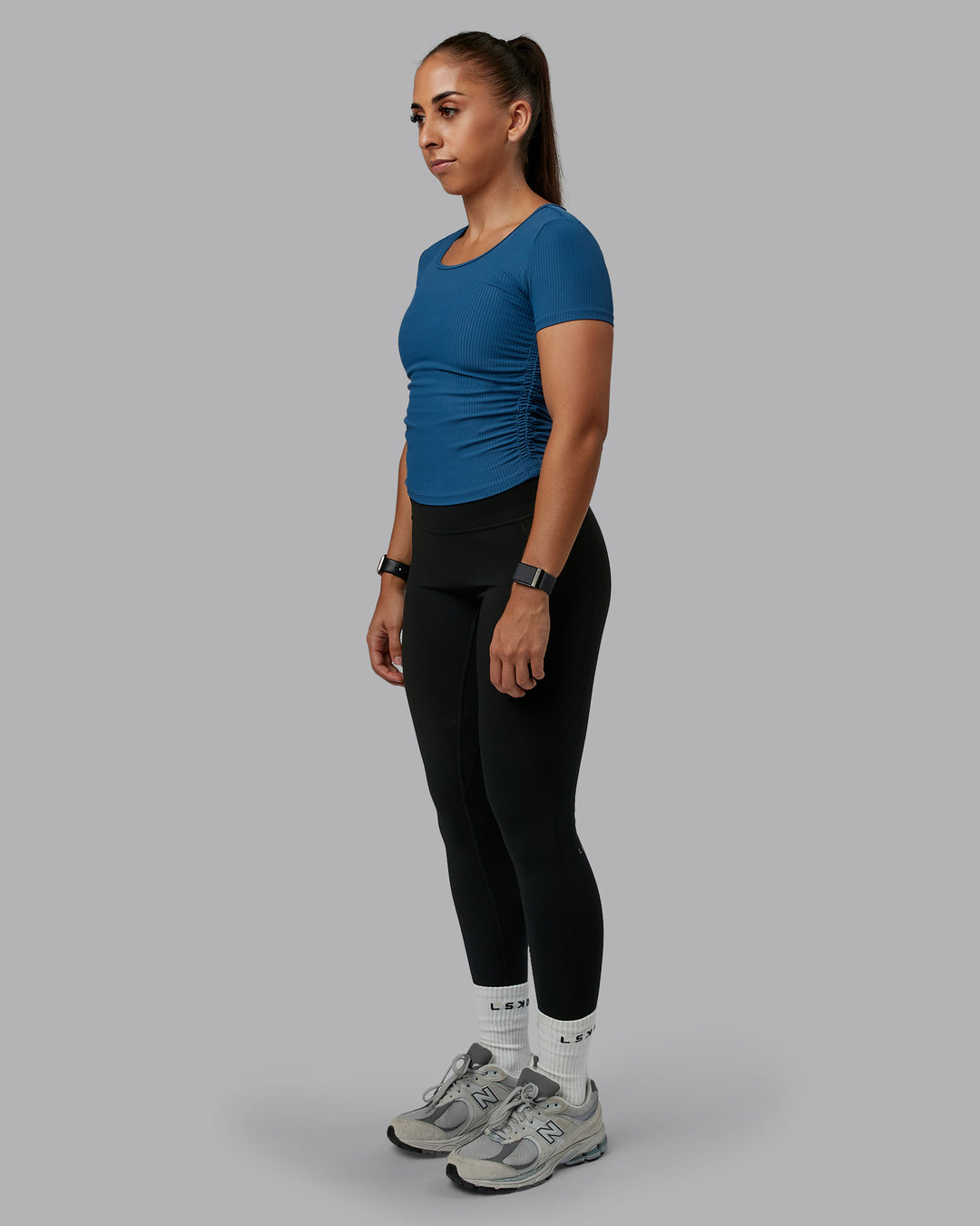 Woman wearing Ignite Ribbed Scrunch Side Cropped Tee - Indigo | Size:S | Model:Tylah - view 5