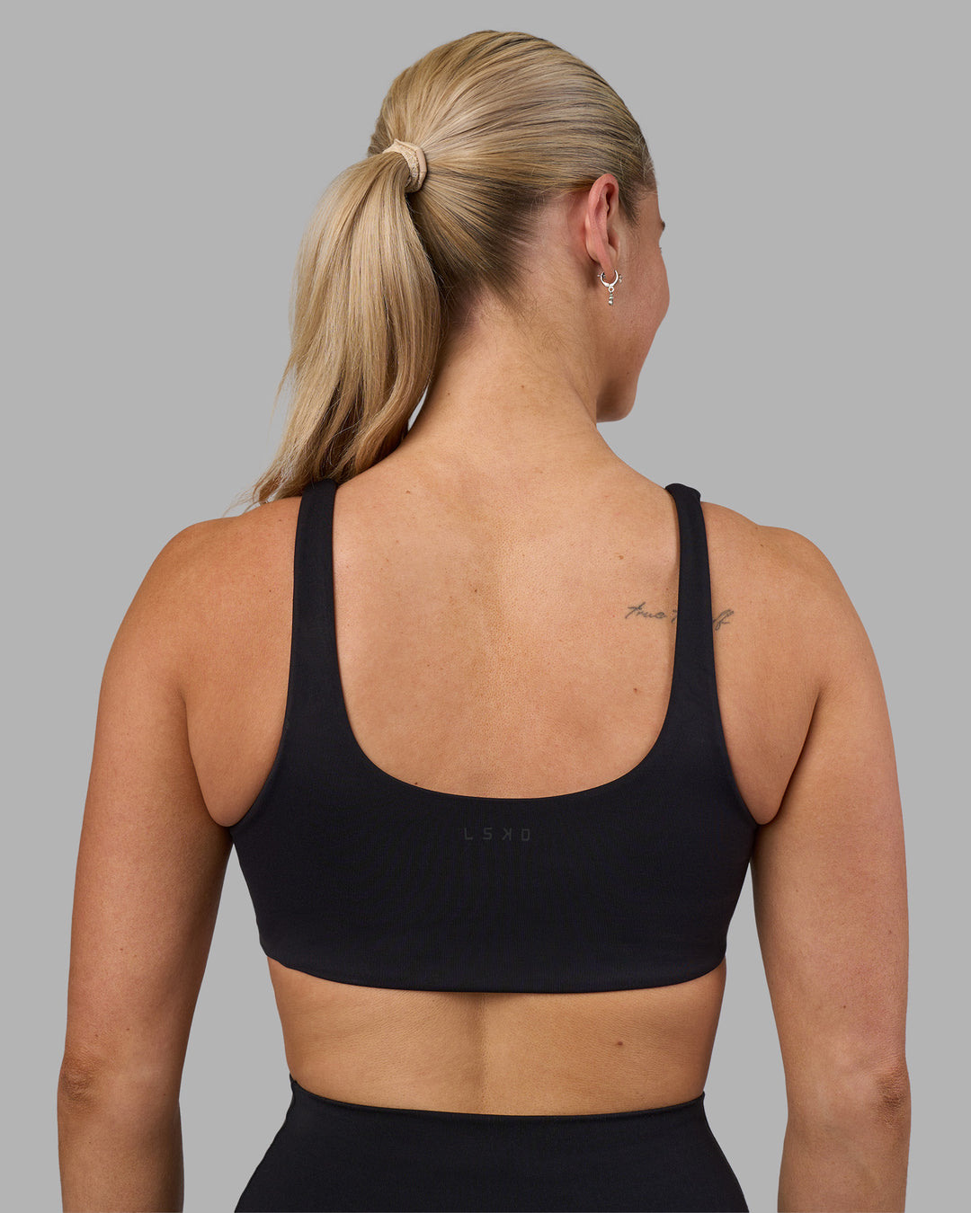 Woman wearing Impulse Reversible Sports Bra - Black | Model:Hannah | Size:S - view 5