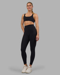Woman wearing Impulse Reversible Sports Bra - Black | Model:Hannah | Size:S | Thumbnail Index: 2