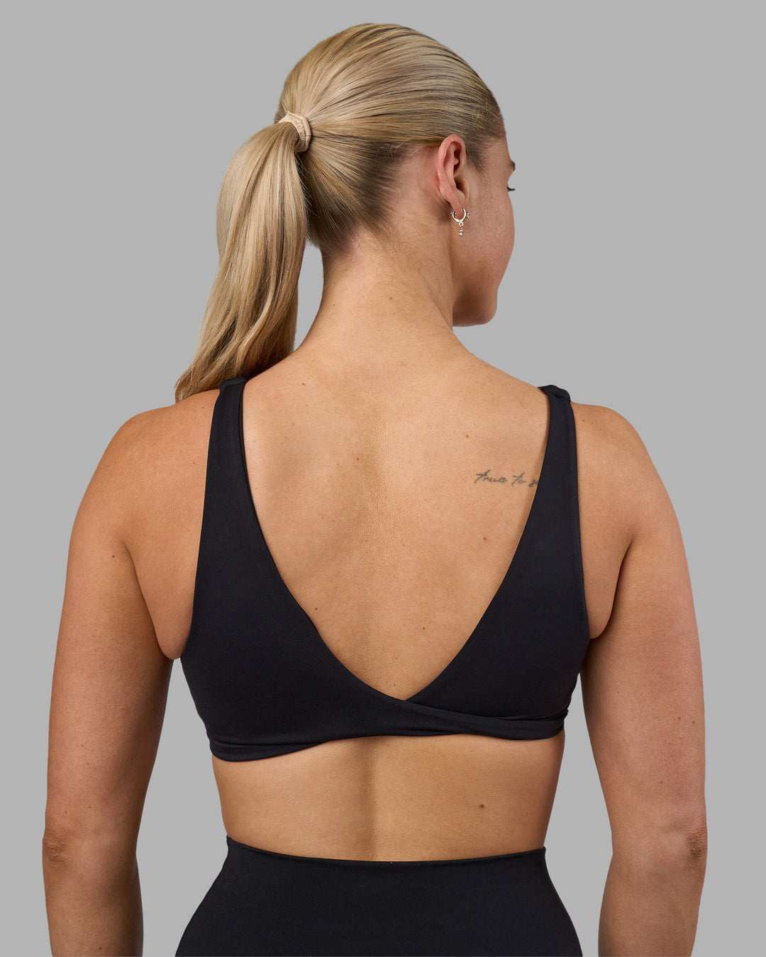Woman wearing Impulse Reversible Sports Bra - Black | Model:Hannah | Size:S - view 6
