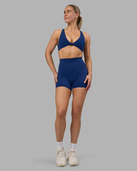 Woman wearing Impulse Reversible Sports Bra - Midnight Blue | Model:Hannah | Size:S | Thumbnail Index: 6