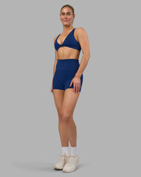 Woman wearing Impulse Reversible Sports Bra - Midnight Blue | Model:Hannah | Size:S | Thumbnail Index: 11