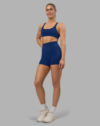 Woman wearing Impulse Reversible Sports Bra - Midnight Blue | Model:Hannah | Size:S | Thumbnail Index: 8