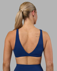 Woman wearing Impulse Reversible Sports Bra - Midnight Blue | Model:Hannah | Size:S | Thumbnail Index: 5