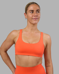 Woman wearing Impulse Reversible Sports Bra - Ultra Orange | Model:Hannah | Size:S | Thumbnail Index: 5