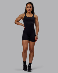 Woman wearing Inertia Bodysuit - Black | Thumbnail Index: 5