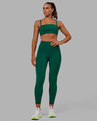 Woman wearing Inspire Sports Bra - Malachite | Thumbnail Index: 8