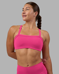 Woman wearing Inspired Sports Bra - Ultra Pink | Model:Hannah | Size:S | Thumbnail Index: 1