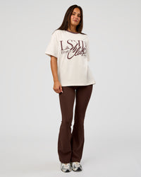 Woman wearing LSKD Fitness Club Heavyweight Oversized Tee - Off White-Cocoa Powder | Model:Bianca | Size:S | Thumbnail Index: 1