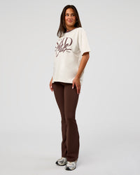 Woman wearing LSKD Fitness Club Heavyweight Oversized Tee - Off White-Cocoa Powder | Model:Bianca | Size:S | Thumbnail Index: 5