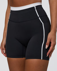 Woman wearing Liberate Contrast High-Rise 6" Short Pockets - Black-White | Model:Bianca | Size:S | Thumbnail Index: 2