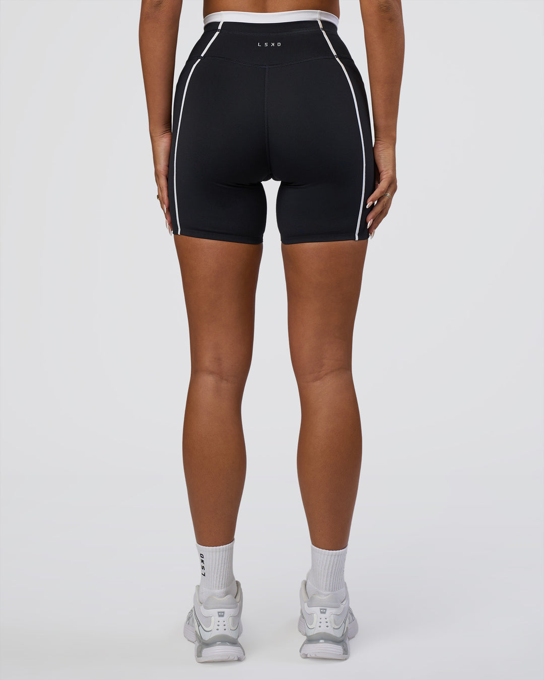 Woman wearing Liberate Contrast High-Rise 6" Short Pockets - Black-White | Model:Bianca | Size:S - view 4