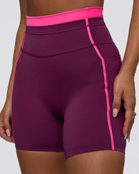 Woman wearing Liberate Contrast High-Rise 6" Short Pockets - Plum Caspia-Ultra Pink | Model:Bianca | Size:S | Thumbnail Index: 2