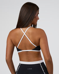 Woman wearing Liberate Sports Bra - Black-White | Model:Bianca | Size:S | Thumbnail Index: 3