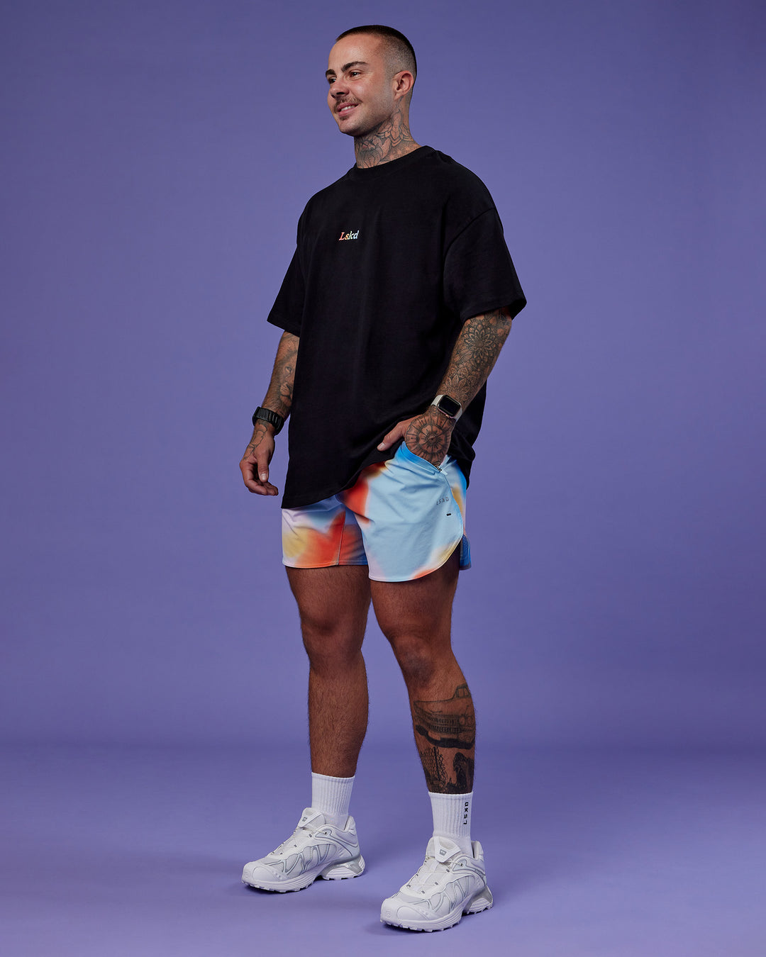Model wearing Lift 6" Short - Rainbow Shade Print | Model:Tayden | Size:S - view 8
