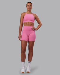 Woman wearing Lift High Neck Sports Bra - Candy Pink | Model:Charlize | Size:S | Thumbnail Index: 5