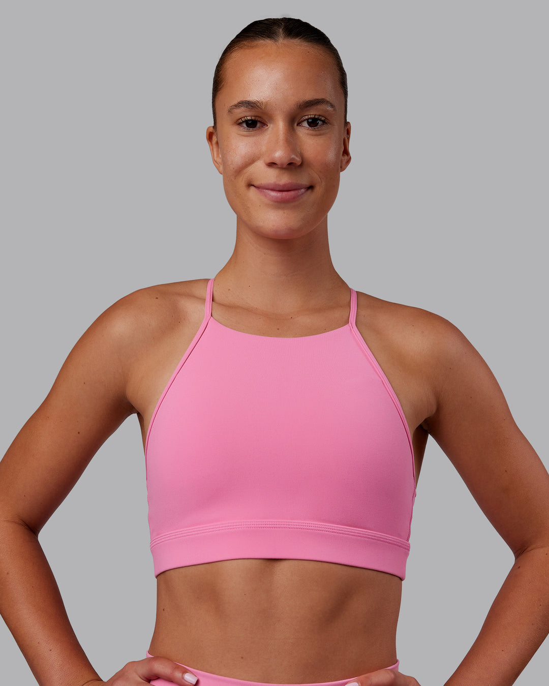 Woman wearing Lift High Neck Sports Bra - Candy Pink | Model:Charlize | Size:S - view 5